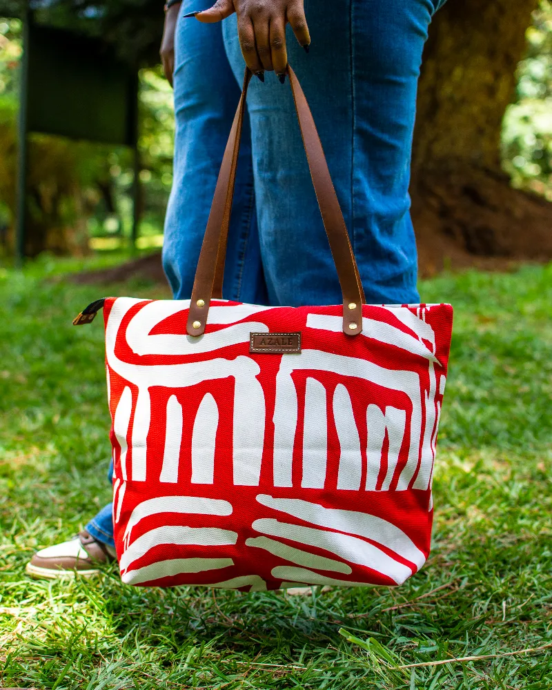 Red Alice tote with blue jeans