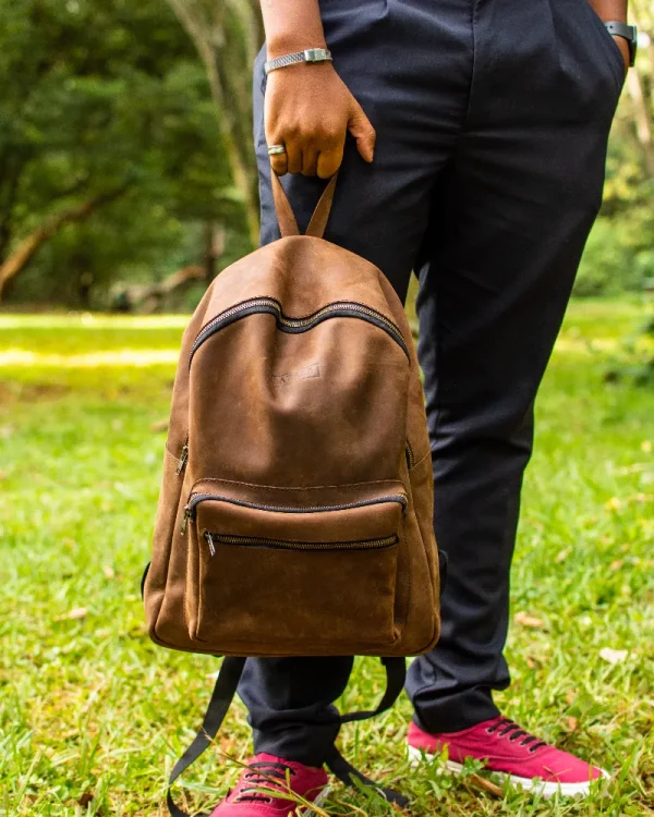 Person holding Brown Azale Backpack