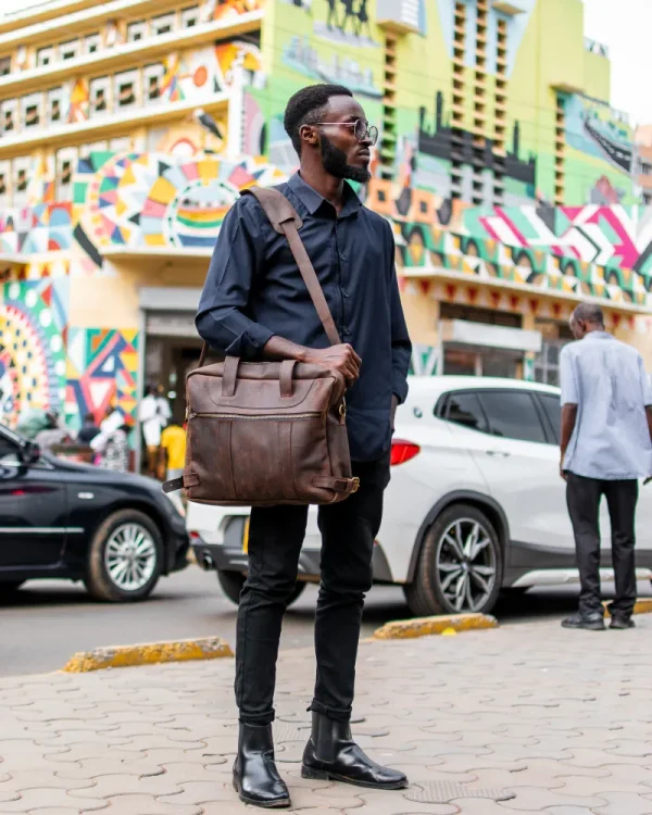 Coffee brown Steha messenger bag in city backdrop